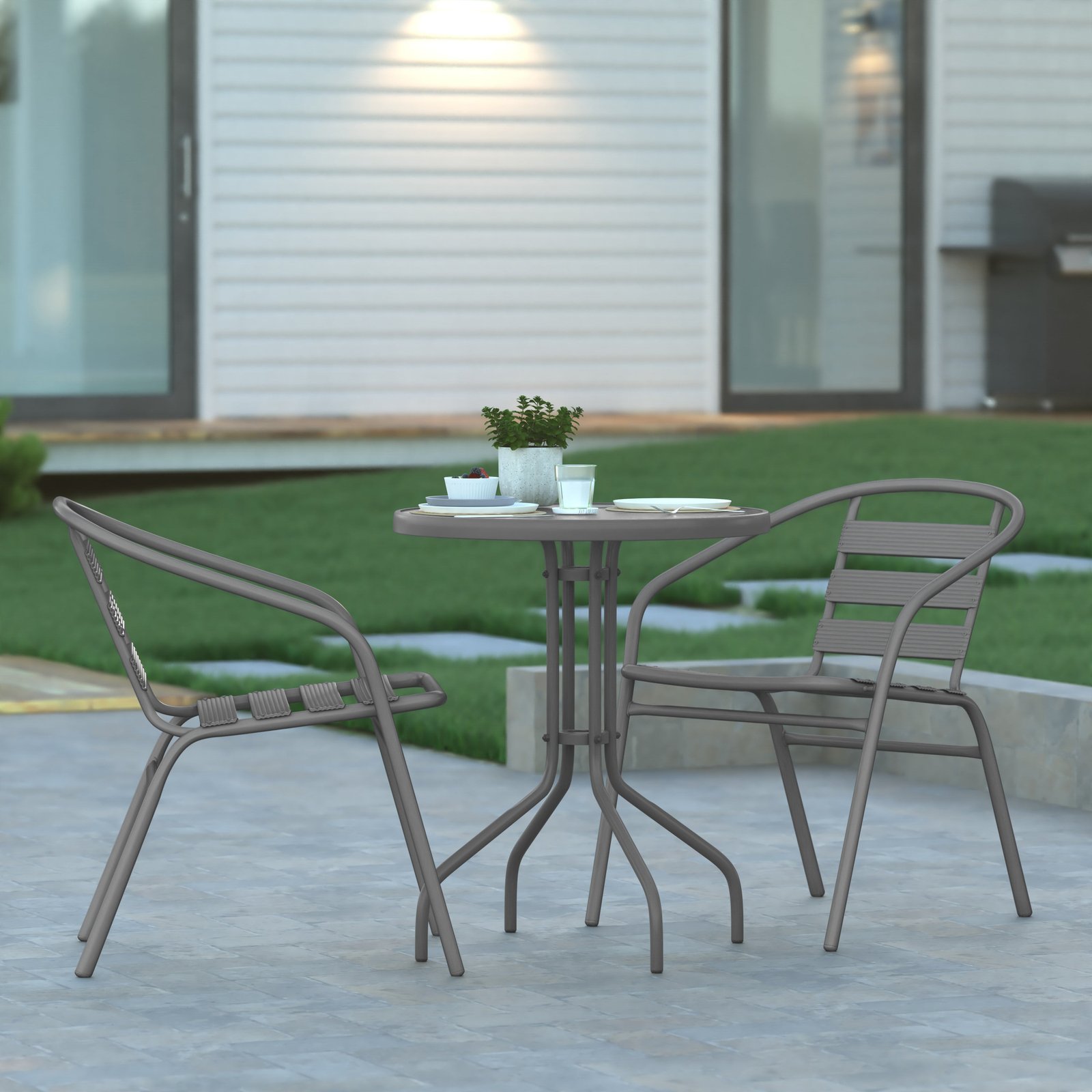 23.75'' Round Glass Top Metal Table with 2 Aluminum Slat Stack Chairs