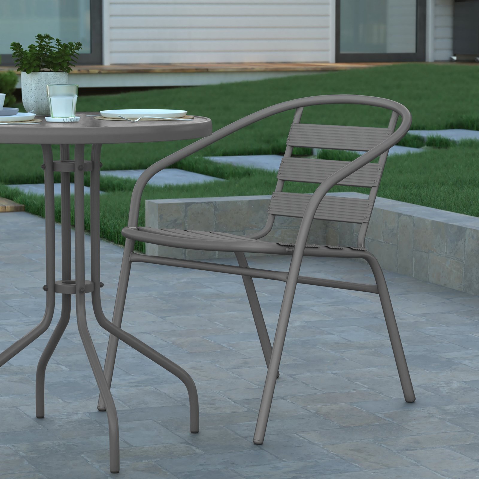 23.75'' Round Glass Top Metal Table with 2 Aluminum Slat Stack Chairs